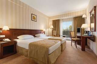 Отель Ramada Hotel & Suites by Wyndham Bucharest North Бухарест Номер Делюкс с 2 отдельными кроватями - Для некурящих-1