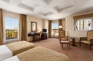 Отель Ramada Hotel & Suites by Wyndham Bucharest North Бухарест Номер бизнес-класса с 1 кроватью размера «king-size» - Для некурящих-7